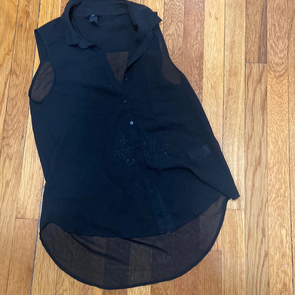 Buttoned, sheer sleeveless top